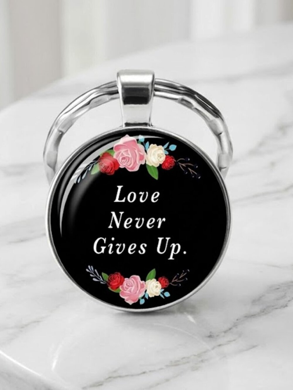 Ladies Black Round Love Never Gives Up Keychain